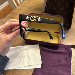 Gucci Black Sunglasses with Gold Emblem and Star Details